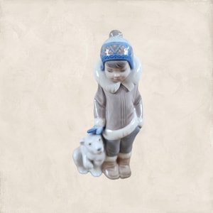 Inuit Lladró  5238  &quot;Eskimo Boy With Pet&quot; his polar bear. Sculpted By  Juan Huerta 6&quot; inches high. Mint condition Lladro #5238 #299