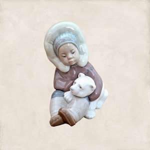 Inuit Lladró  1195  &quot;Eskimo&quot; boy with his polar bear. Sculpted By  Juan Huerta 4.75&quot; inches high. Mint condition Lladro #1195 #298