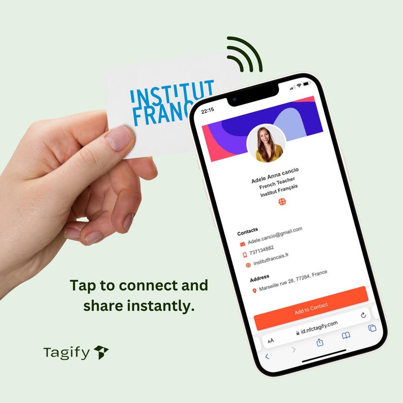 May include: A smartphone screen displaying a digital business card for Adele Anna cancio, a French teacher at Institut Fran&ccedil;ais. The card includes contact information, including an email address, phone number, and website. The screen also shows a map pin with the address Marseille rue 28, 77284, France. The text "Tap to connect and share instantly." is displayed below the phone screen.