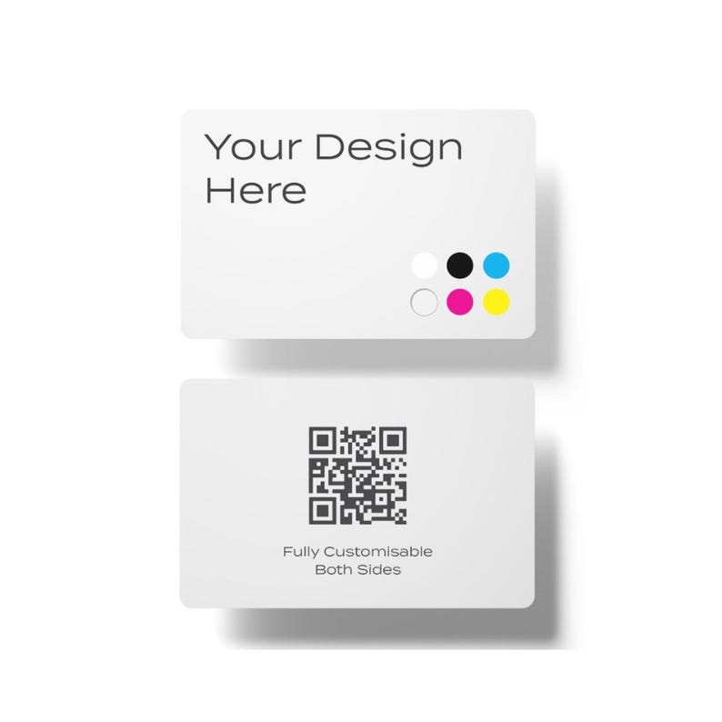 May include: Two white business cards. The top card has the text "Your Design Here" and four color swatches: white, black, cyan, magenta, and yellow. The bottom card has a black and white QR code and the text "Fully Customisable Both Sides".