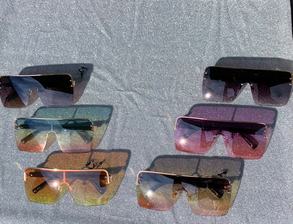 Sunglasses with gold trim on top sale