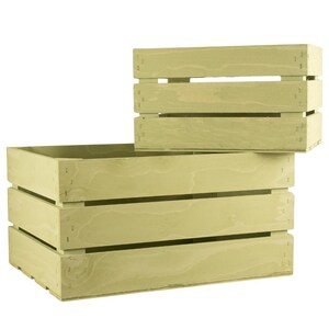 May include: Two wooden crates, one stacked on top of the other. Both crates are painted a light green color and have a rustic look. The larger crate has three horizontal slats, while the smaller crate has two.
