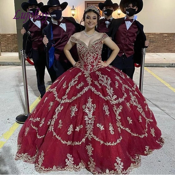 red and gold quince dresses