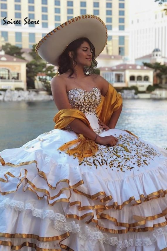 white and gold quinceanera dresses