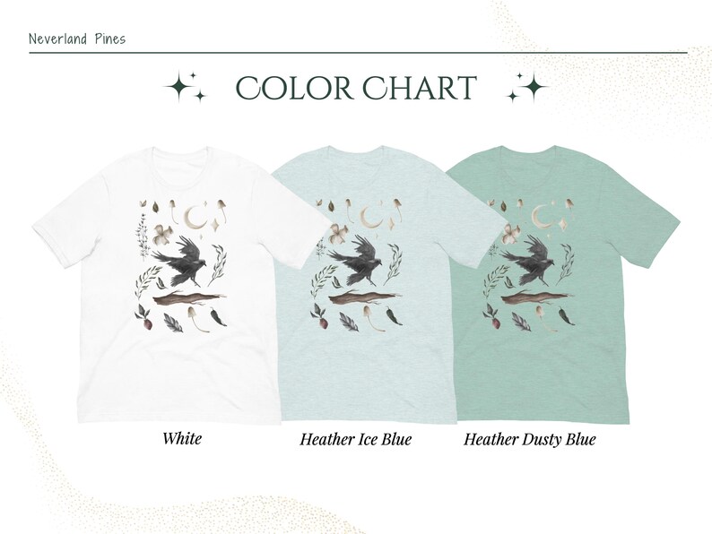 May include: A colour chart shows three t-shirts: white, heather ice blue, and heather dusty blue. Each shirt features a watercolour design of a crow in flight, surrounded by botanical elements. The text "COLOR CHART" is at the top.