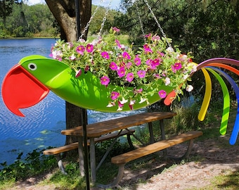 Gabby-- Natural colored Green Parrot that has always been a customer favorite.  :)