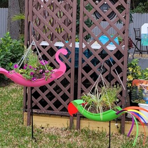 Fancy Flo the Flamingo. Definitely a must have. Bright pink in color and manufactured by USA Planter. image 8