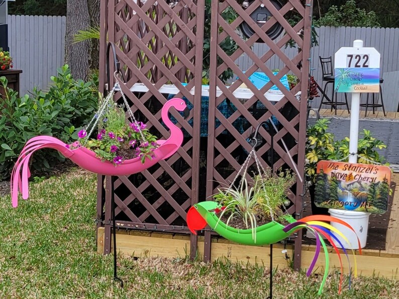 Fancy Flo the Flamingo. Definitely a must have. Bright pink in color and manufactured by USA Planter. image 8