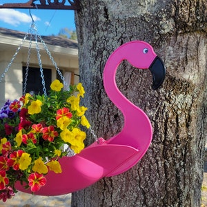 Fancy Flo the Flamingo. Definitely a must have. Bright pink in color and manufactured by USA Planter. image 7