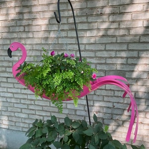 Fancy Flo the Flamingo. Definitely a must have. Bright pink in color and manufactured by USA Planter. image 6