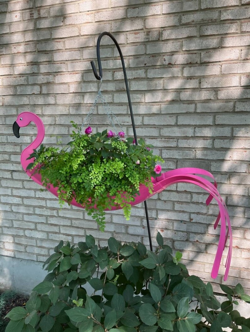 Fancy Flo the Flamingo. Definitely a must have. Bright pink in color and manufactured by USA Planter. image 6