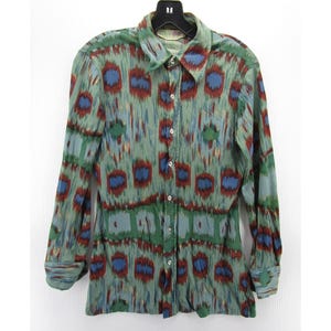 May include: A set of three ceramic mugs with a speckled, matte finish. The mugs are in shades of cream, light gray, and dark gray. Each mug has a simple, minimalist design, perfect for coffee or tea.