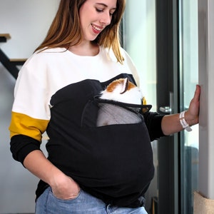 Sustainable sweater with pet pouch for cat or dog