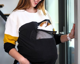Sustainable sweater with pet pouch for cat or dog