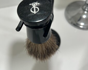 Vintage shaving set with pure Badger hair and made in England.