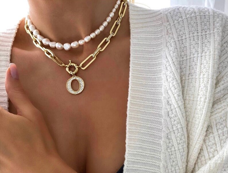 Gold chain link necklace with white crystals