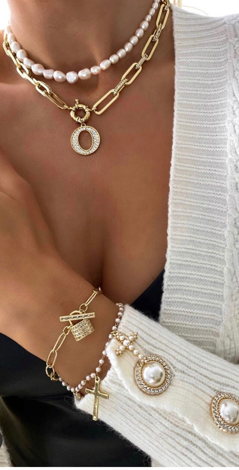 Gold chain link necklace with white crystals