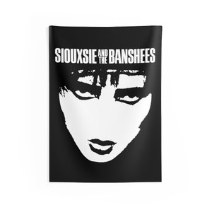 May include: Black and white tapestry featuring a close-up of Siouxsie Sioux's face with the text "Siouxsie and the Banshees" above.