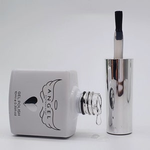 May include: A white bottle of Angel Professional Gel Polish with a silver cap and a black brush. The bottle is labeled "GEL POLISH 10ml e 0.35fl oz".
