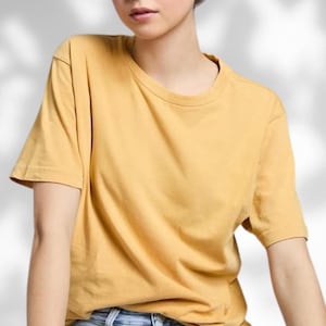 ヴィンテージのアシッドウォッシュ加工イエローシャツ、ブリーチ加工Tシャツ、ダメージ加工Tシャツ、無地コットンTシャツ、レディース用無地Tシャツ、卸売Tシャツ