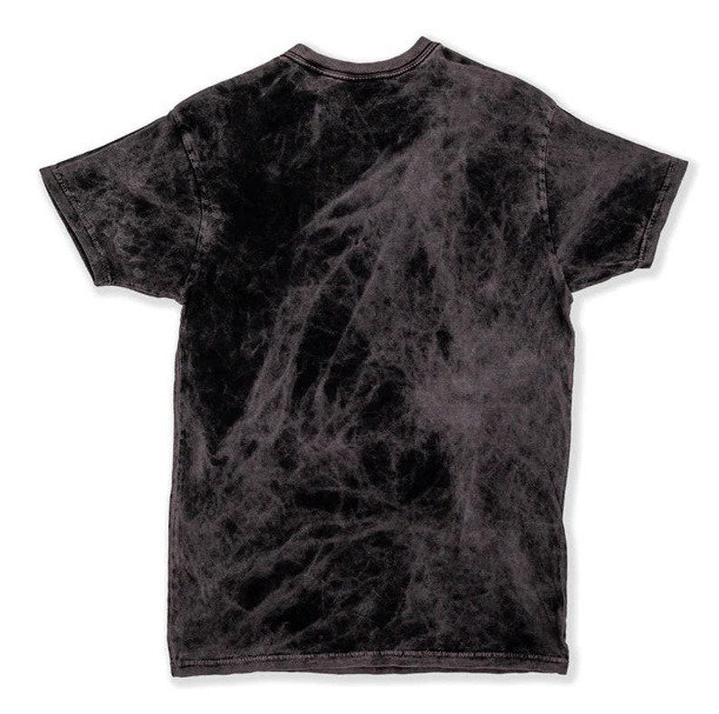 May include: A black acid wash t-shirt with short sleeves and a crew neck.