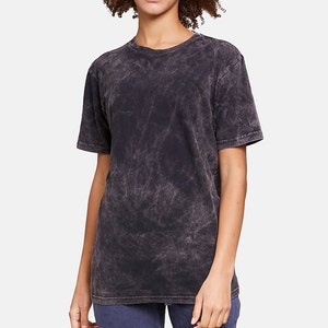 May include: A black acid wash t-shirt with a crew neck and short sleeves.