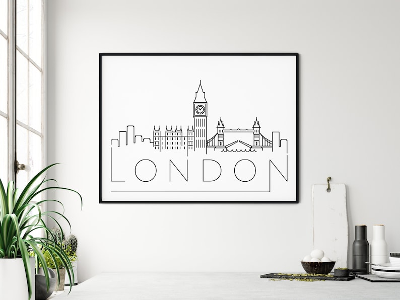 May include: Black and white line art print of the London skyline featuring Big Ben, the Houses of Parliament, and Tower Bridge. The word "LONDON" is written below the skyline.