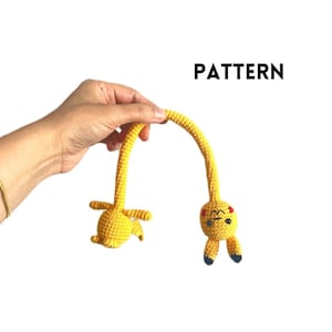 May include: A set of three ceramic nesting bowls in graduating sizes. The bowls feature a speckled, matte finish in shades of cream, light brown, and dark brown. The largest bowl measures approximately 8 inches in diameter.