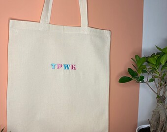 70s style harry flower kindness tpwk tote bag