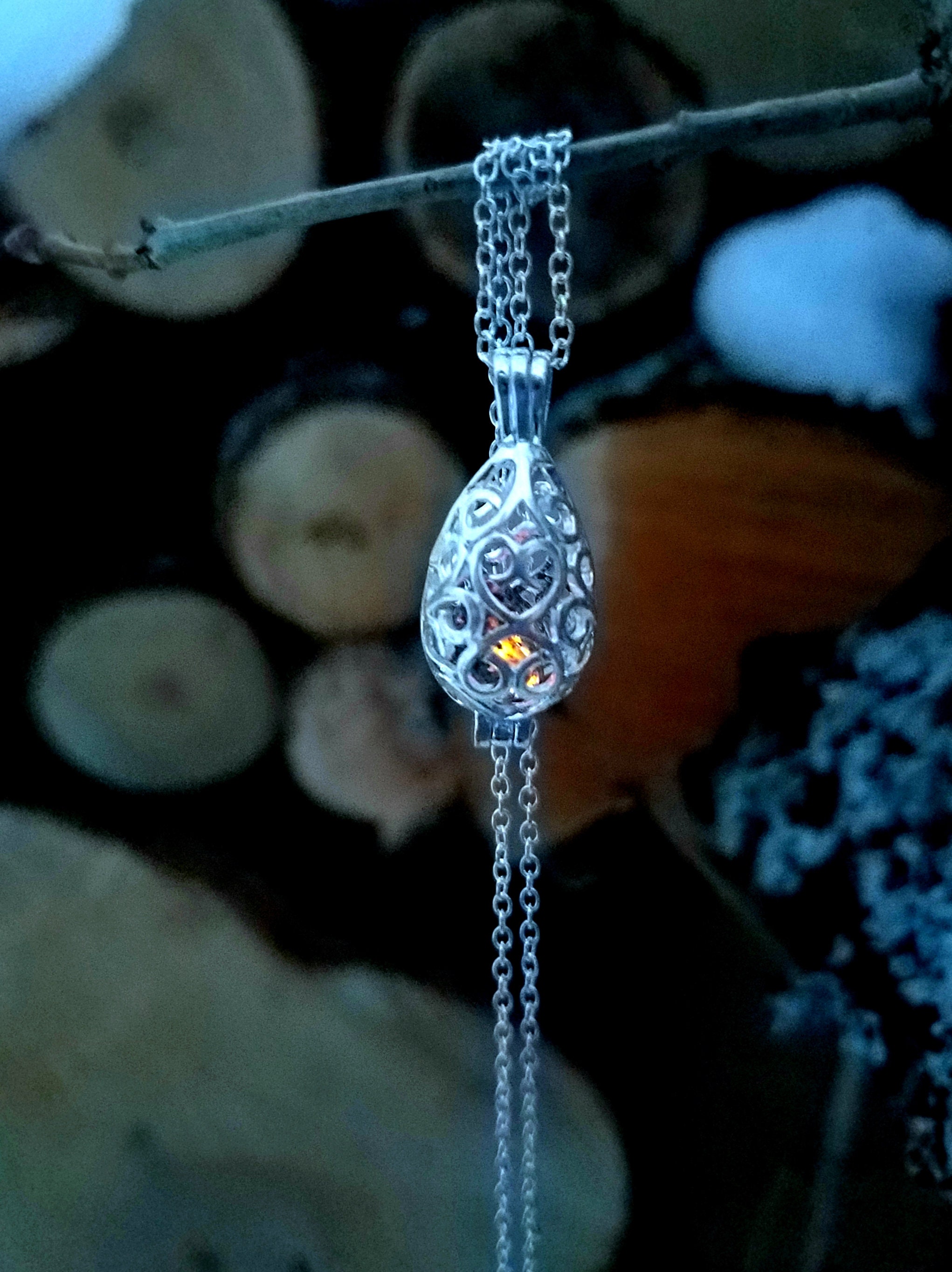 Silver Teardrop Cage Locket With Tiny Yooperlite Inside