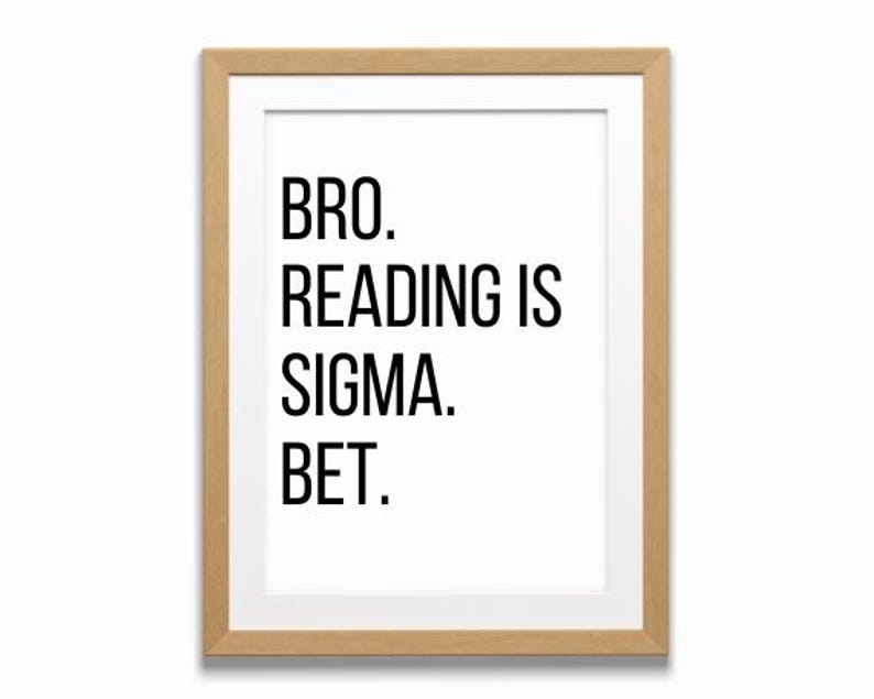 May include: A framed print with the text "BRO. READING IS SIGMA. BET." in black lettering on a white background.