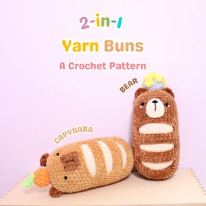 May include: Two crocheted stuffed animals, a brown bear and a brown capybara, both shaped like bread loaves. The bear has a blue and yellow flower on its head. The capybara has a green and orange carrot on its head. The text "2-in-1 Yarn Buns A Crochet Pattern" is above the animals.
