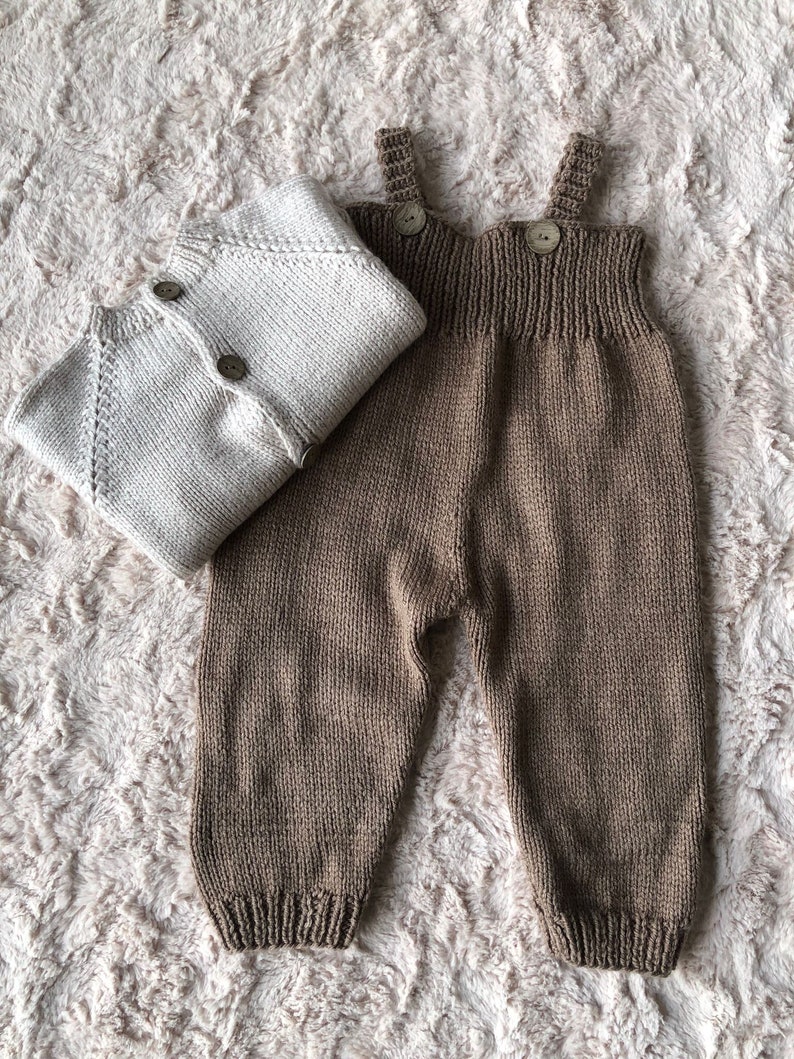 Set of brown overalls and ivory cardigan for babies under age 1.