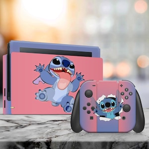 May include: A pink and blue Nintendo Switch console and controller skin featuring Stitch from Lilo & Stitch. The console skin has a pink background with a blue Stitch character. The controller skin has a pink and blue gradient background with a blue Stitch character peeking out of a hole.