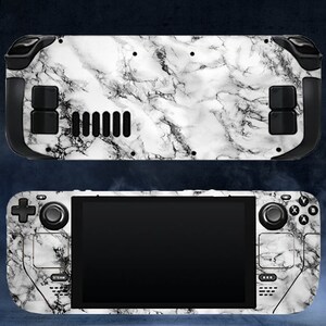 May include: A white handheld gaming console with a marble pattern design. The console has black buttons and a black screen.