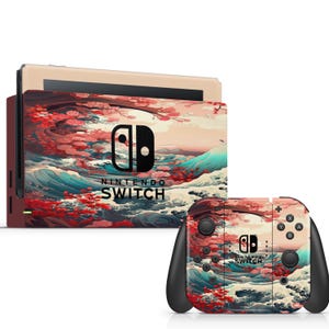 May include: Nintendo Switch console and controllers with a custom skin featuring a Japanese-inspired design. The skin showcases a vibrant scene of ocean waves, cherry blossoms, and a mountain range. The console and controllers are black and red.