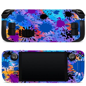 May include: A handheld gaming console with a blue, purple, orange and black paint splatter design.