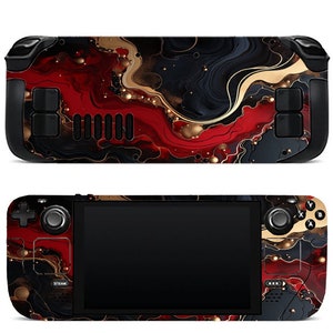 May include: A black and red gaming console with a gold and black abstract design. The console has a screen, buttons, and joysticks.