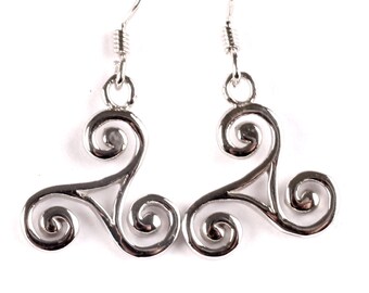 May include: Silver earrings with a Celtic knot design. The earrings are in the shape of a triple spiral, also known as a triskelion.