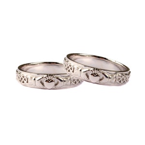 Claddagh sterling Silver His and Hers Wedding Ring Set.