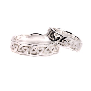 Celtic Design Sterling Silver His and Hers Wedding Ring Set.