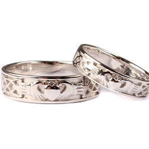 Claddagh Sterling Silver His and Hers Wedding Ring Set.