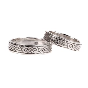 Celtic Design Sterling Silver His and Hers Wedding Ring Set.