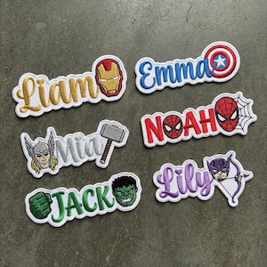 May include: A handmade wooden sign with the text "Welcome" in a playful font. The sign is painted white with a distressed finish, and features a small, decorative heart. It's designed for indoor or outdoor use.