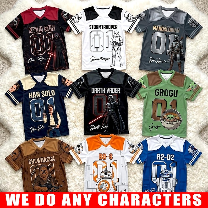 May include: A collection of eight short-sleeve V-neck jerseys featuring Star Wars characters including Kylo Ren, Stormtrooper, Mandalorian, Han Solo, Darth Vader, Grogu, Chewbacca, BB-8, and R2-D2, each with the number 01 and character names printed.