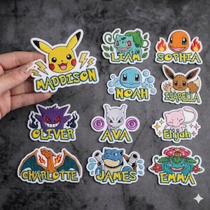 May include: A collection of embroidered patches featuring various Pokémon characters, each with a name. The patches include Pikachu, Bulbasaur, Charmander, Squirtle, Eevee, Gengar, Mewtwo, Mew, Charizard, Blastoise, and Venusaur.