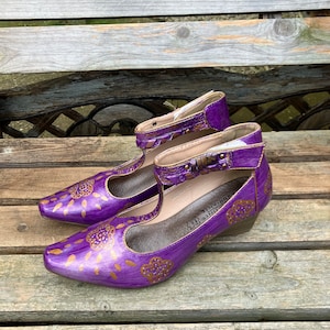 Hand painted shoes, individual designs. Art on a shoe.