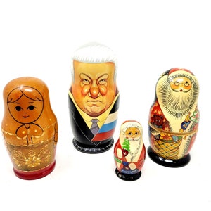 Vintage Lot Of 4 Russian Matryoshka Wooden Nesting Doll Sets Gorbachev Santa