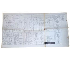 May include: A black and white wiring diagram for a car. The diagram shows the location of various electrical components, including the headlights, taillights, and turn signals. The diagram also includes a legend that explains the symbols used in the diagram.