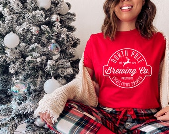 North Pole Brewing Co Christmas Spirits, Hot Cocoa Shirt, North Pole Shirt, Holiday Apparel, Christmas Party Shirt, Unisex Christmas Shirt
